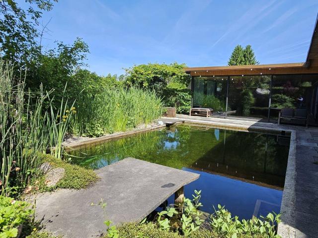 Einzigartiges Wohn und Seminarhaus in Dornbirn mit großem Grundstück, Schwimmteich und Spa Bereich!