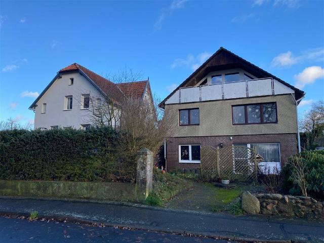 Ein bis Zwei Fam. Haus + Drei Fam. Haus + Bauland