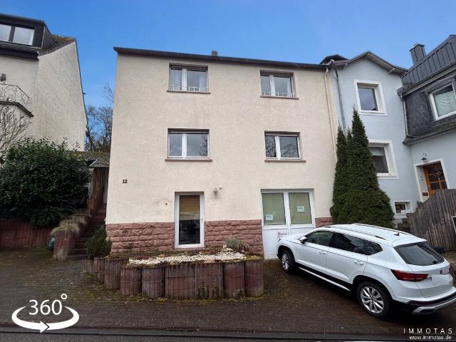Ein bis Zweifamilienhaus mit Gewerbefläche im Untergeschoss bietet Gestaltungspotenzial