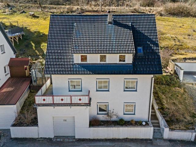Ein Zuhause zum Wohlfühlen: Einfamilienhaus mit Garten und Garage