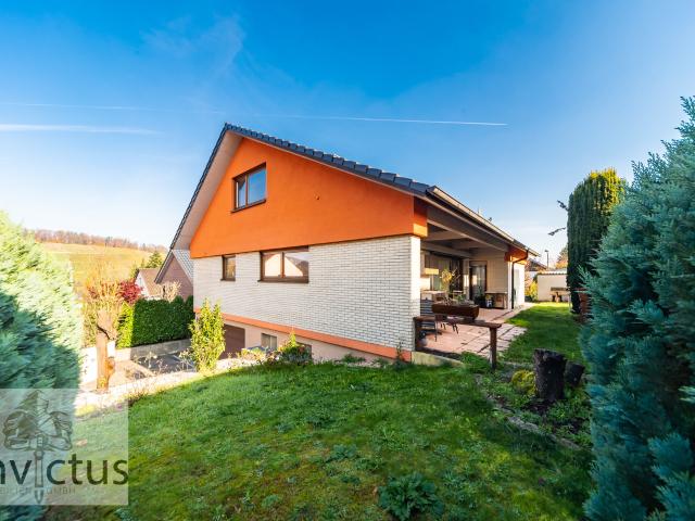 Ein Zuhause, das Größe zeigt – lichtdurchflutet, elegant, und einfach cool mit Garten und Garage in ruhiger Lage