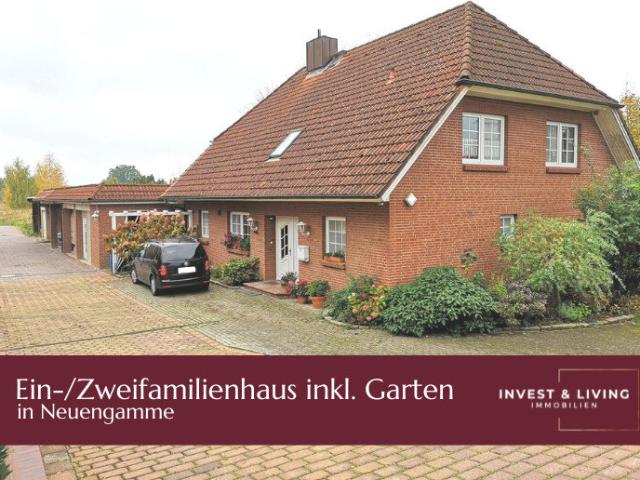Ein /Zweifamilienhaus mit großem, grünen Garten & Bebauung einer landwirtschaftlichen Fläche