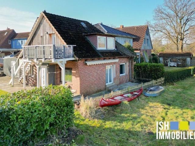 Einfamilienhaus mit Einliegerwohnung und Blick in die Schwingewiesen