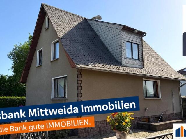 Einfamilienhaus mit großem Grundstück und vielseitigem Nebengebäude in ruhiger Lage
