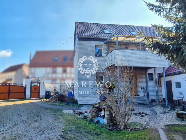 EINFAMILIENHAUS MIT TEILBAREM GRUNDSTÜCK IN RUHIGER LAGE