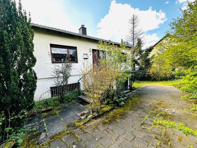 Einfamilienhaus mit Weitblick Exklusiver Bungalow in begehrter Lage auf dem Hobels