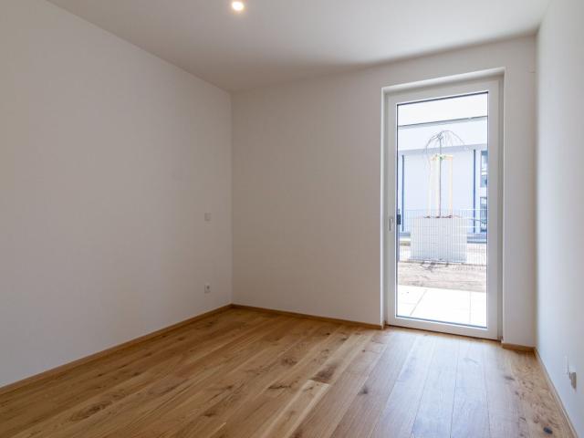 Eigengarten & Viel Sonne: 2 Zimmer Wohnung mit Südost Ausrichtung | Top 2