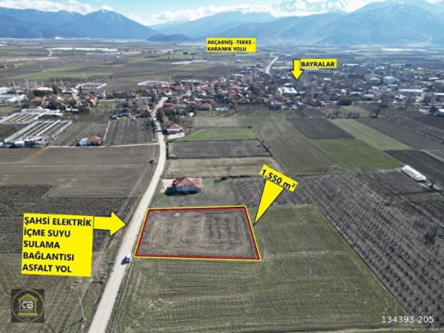ELMALI BAYRALAR MAH.ARSA KONUMUNDA EVYAPIMINA UYGUN 1.550 m HOBİ BAHÇESİ SATILIKTIR