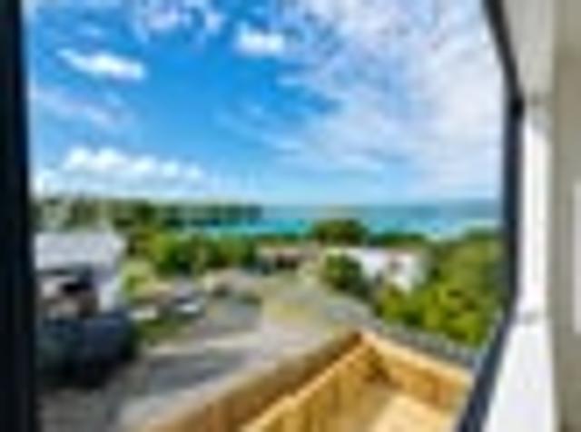 Elevated Hillsborough Living with Serene Sea Views