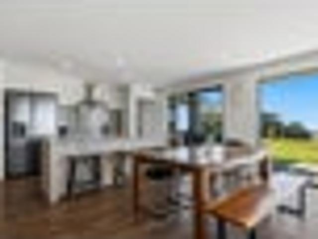 Elevated living with panoramic coastal views
