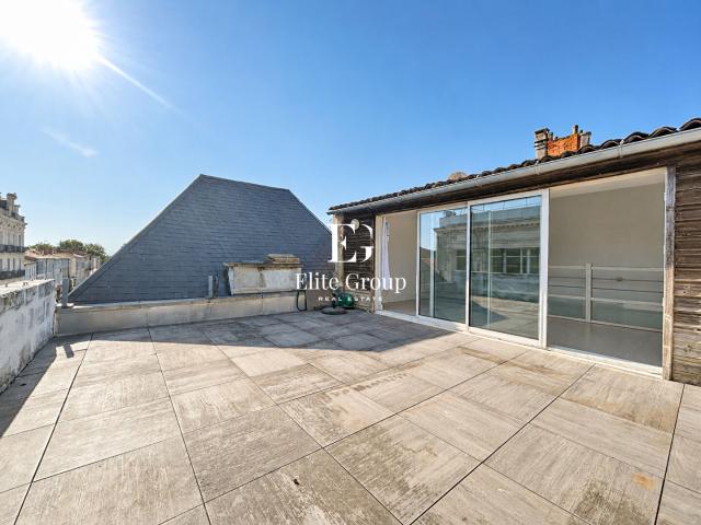 Elégant appartement esprit maison de ville avec terrasse sur les toits