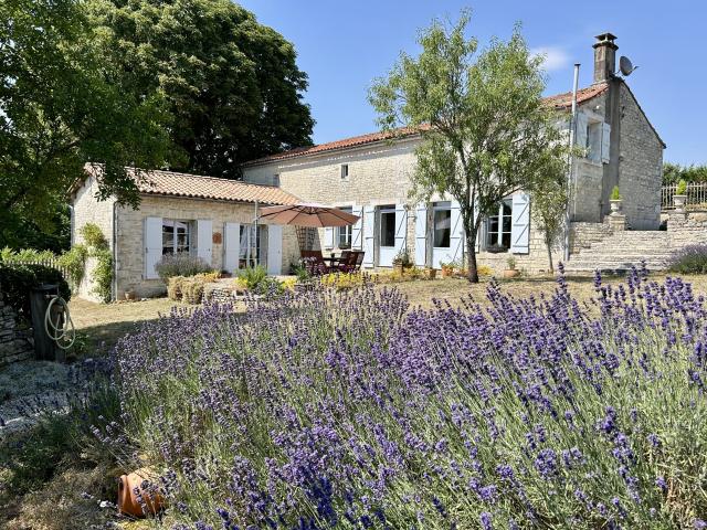 Elegant Character Home with Gardens & Outbuildings