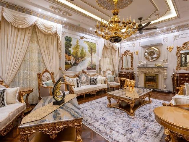 Elegant & Stylish 1 Kanal Semi Furnished Home In DHA Phase 7 Spacious Interiors, Designer Finish, 5 Master Bedrooms, 2 TV Lounges, 2 Company Kitchens, Lush Green Lawn, Eye Catching Front, Fast Deal Guaranteed!