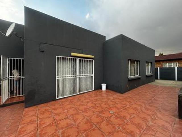 elegant townhouse with private garde.