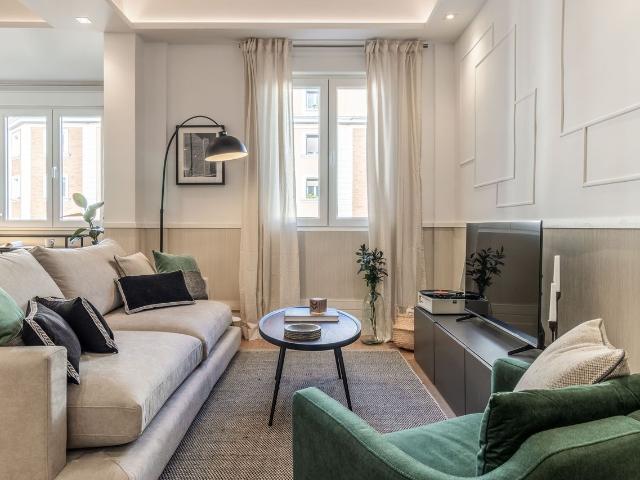 Elegant 3 Bedroom Apartment with Modern Design and Smart Amenities in Retiro, Madrid Amsterdam Apartments for Rent