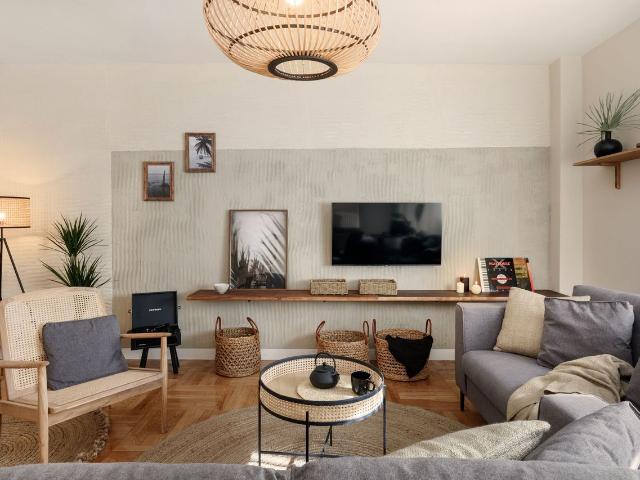 Elegant 3 Bedroom Indonesian Inspired Oasis with Private Terrace in Almagro, Madrid Amsterdam Apartments for Rent