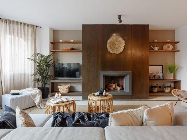 Elegant 4 Bedroom Apartment with Southeast Asian Inspired Design in Almagro, Madrid Amsterdam Apartments for Rent