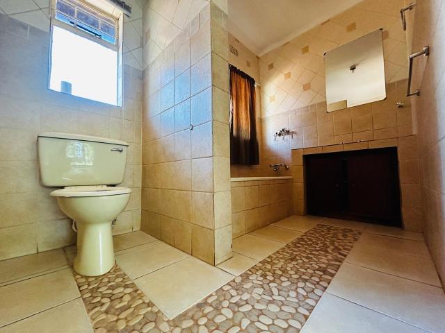 Elegant 4 Bedroom Home in an Exclusive Suburb with Granny Flat and Lush Garden
