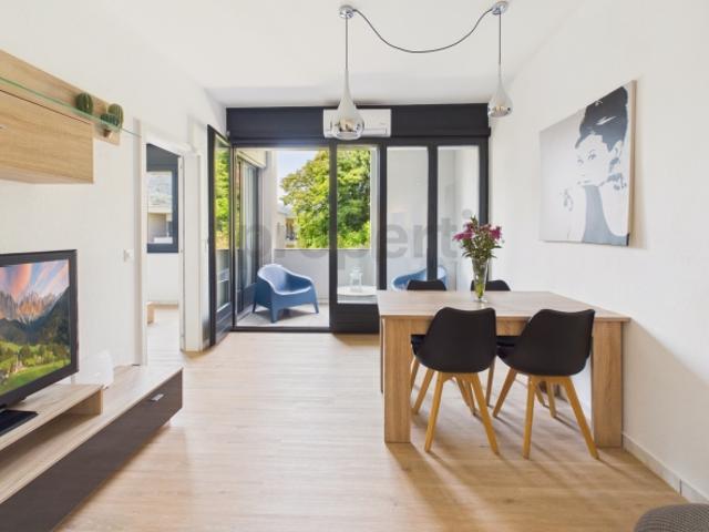 Elegante 3.5 locali stepped flat con balcone, Lugano