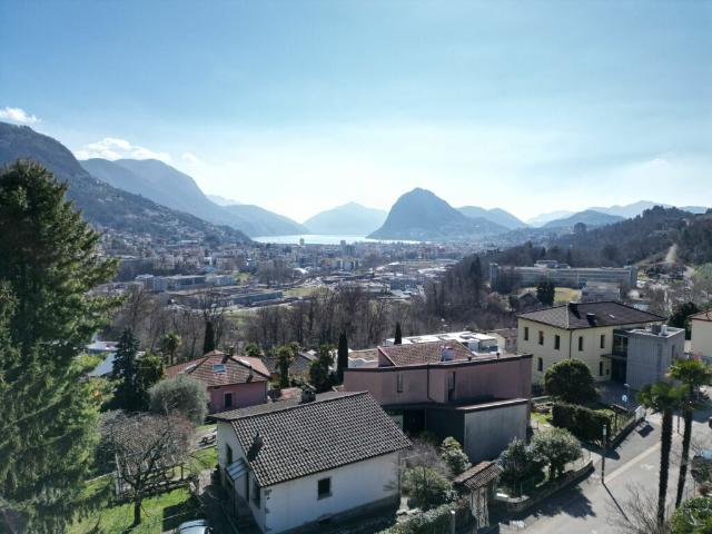 Elegante Villa in Stile Mediterraneo con Vista Mozzafiato sul Golfo di Lugano