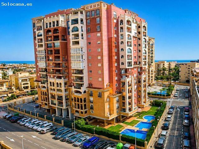 Elegante apartamento a solo 100 metros de la Playa de Los Locos con piscina, parking y seguridad 24