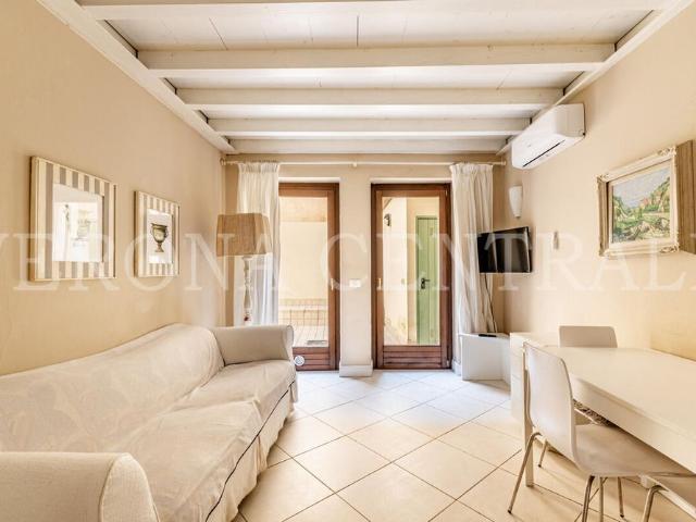 Elegante Bilocale con Corte Privata in zona B. Trento
