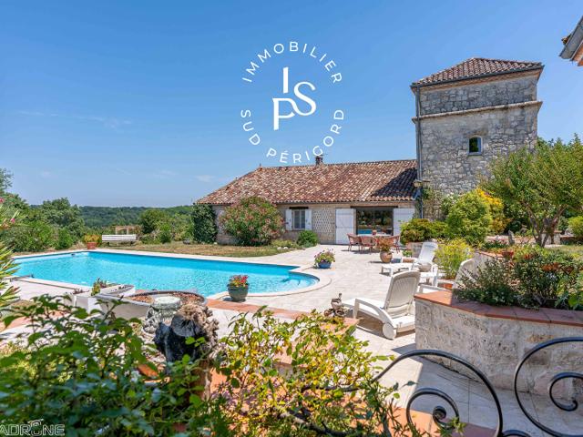 Elégante propriété en pierre avec piscine et parc arboré