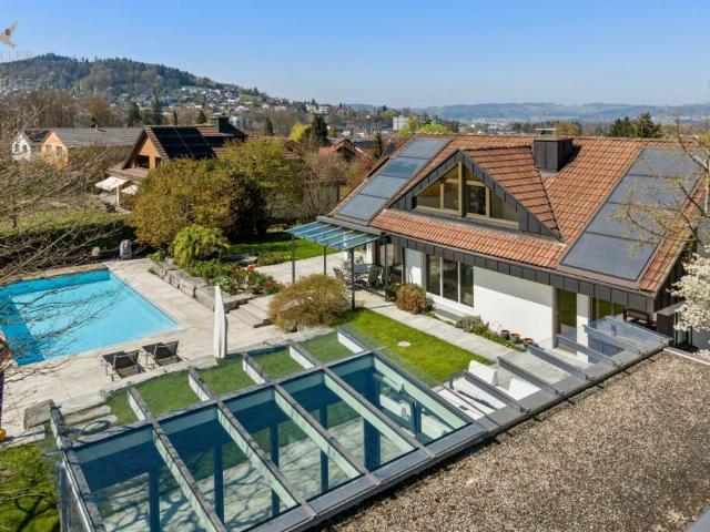 Elegantes Einfamilienhaus mit traumhafter Gartenanlage und Poolidylle