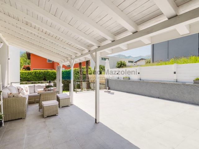 Eleganz und zeitgemäßer Komfort – Modernes Haus mit Aussicht in Gudo | dreamo. Ch