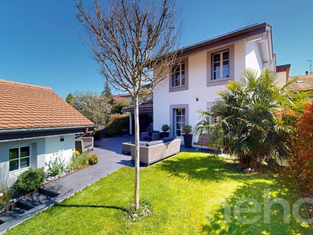 Eleganz und Komfort in einem Familienhaus mit Garten in Satigny