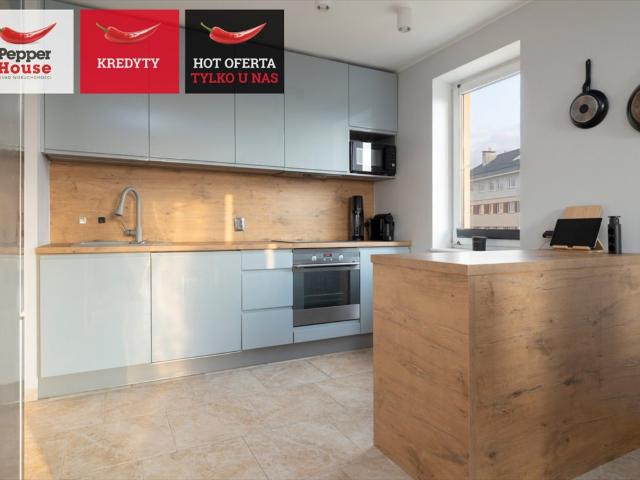Elegancki 3 pokojowy apartament z dużym balkonem i miejscami parkingowymi