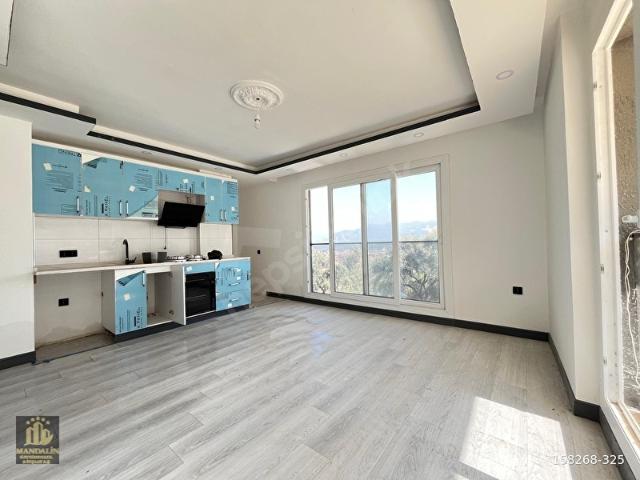 ELVAN ÖZÇELİ'DEN GÜMÜŞLÜK'DE SATILIK 1+1 DAİRE