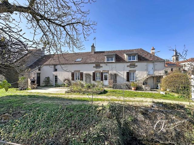 En exclusivité,charme et authenticité pour cet ancien corps de ferme