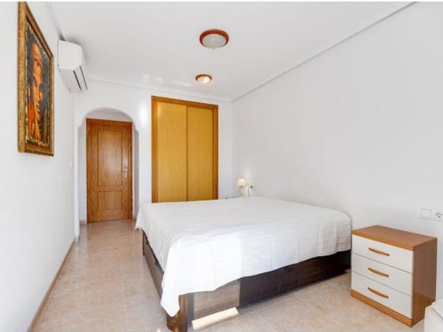 ENCANTADOR APARTAMENTO EN PLAYA FLAMENCA ORIHUELA COSTA CON PISCINA COMUNITARIA
