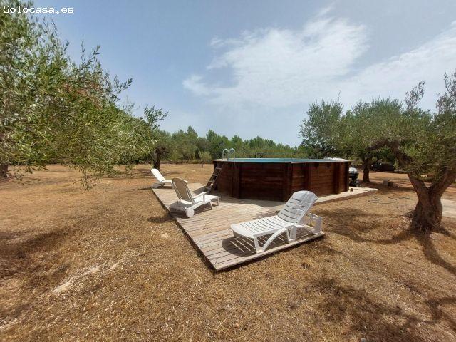 Encantadora Finca Rústica en El Perello con Amplio Terreno y Piscina