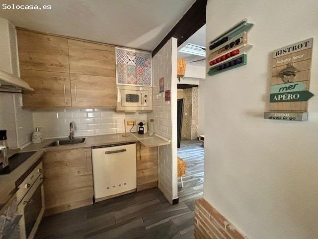 Encanto Histórico en el Corazón de la Ciudad: Casa/Piso con Potencial Único