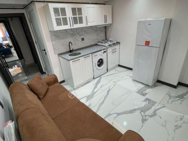 Ender Uysal Gayrimenkulden Garaja Yakın Satılık 1+1 Lüx Apart.