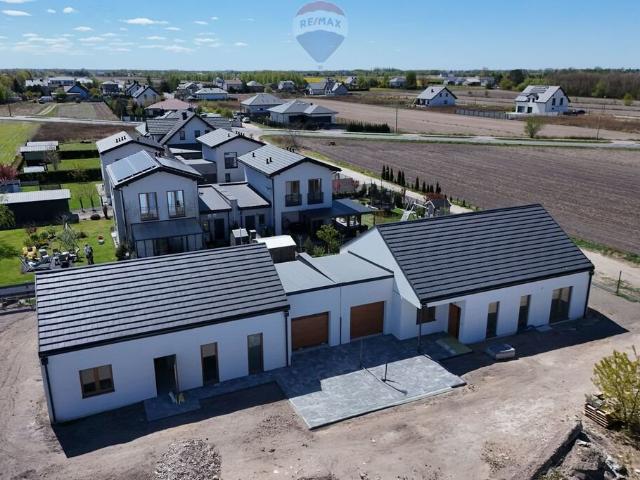 Energooszczędny bliźniak 100 m² z garażem, nowoczesny standard