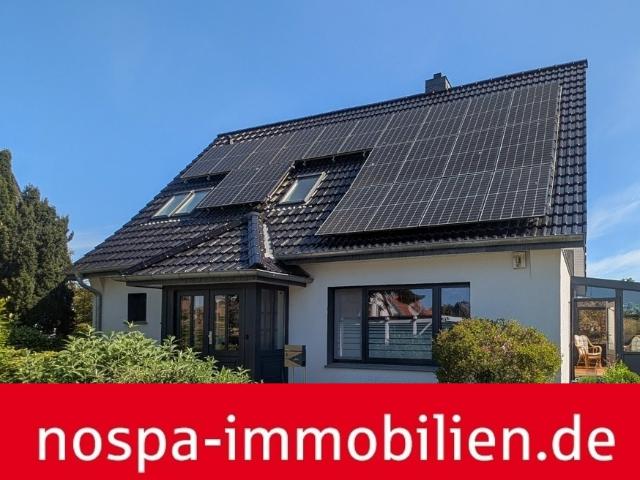 Energetisch modernisiertes Einfamilienhaus mit Wintergarten und PV Anlage in ruhiger Feldrandlage!