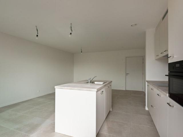 Appartement met 2 slaapkamers, Z terras en ondergrondse autostaanplaats in hartje Schilde