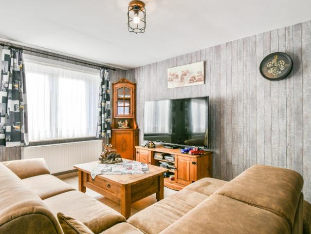 Energiezuinig appartement met garage en polyvalent bijgebouw!