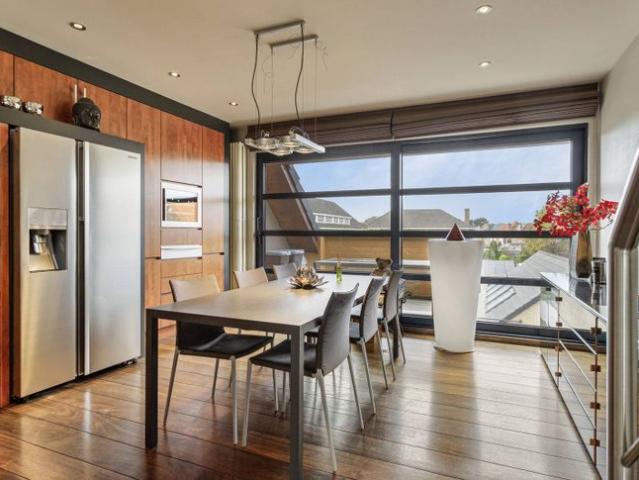 Energiezuinige triplex met garage te koop in de Brugse rand