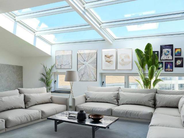 Engel & Völkers Penthouse mit großer Aufdachterrasse mit Panoramablick über Mitte