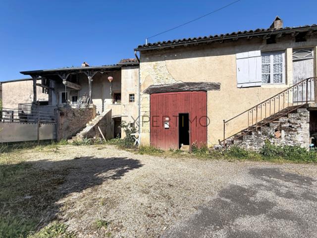 Ensemble en pierre avec dépendances et terrain constructible