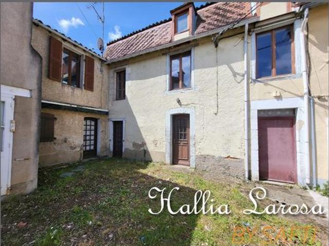 Ensemble immobilier avec garage et jardin