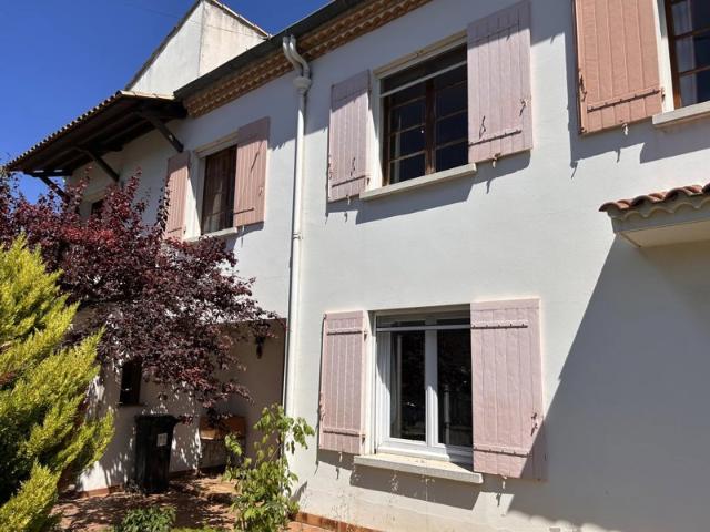 Ensemble immobilier avec jardin et garages centre Ville Exclusivité