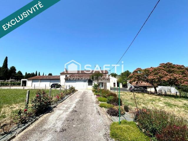 Ensemble immobilier: 2 maisons / hangars /annexes