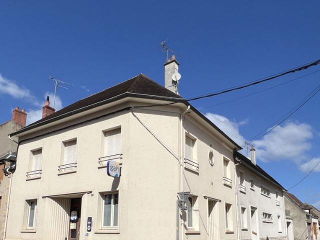 Ensemble Immobilier de deux maisons de villes avec commerce