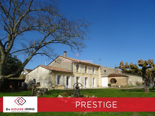 ENSEMBLE IMMOBILIER DE 560 M²