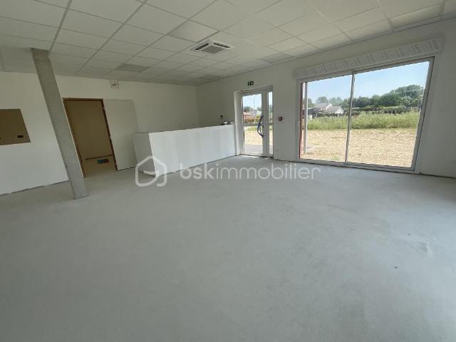 ENSEMBLE IMMOBILIER PROFESSIONNEL – LOCAL + APPARTEMENT + GARAGE – 410 m² – ZONE ARTISANALE DYNAMIQUE